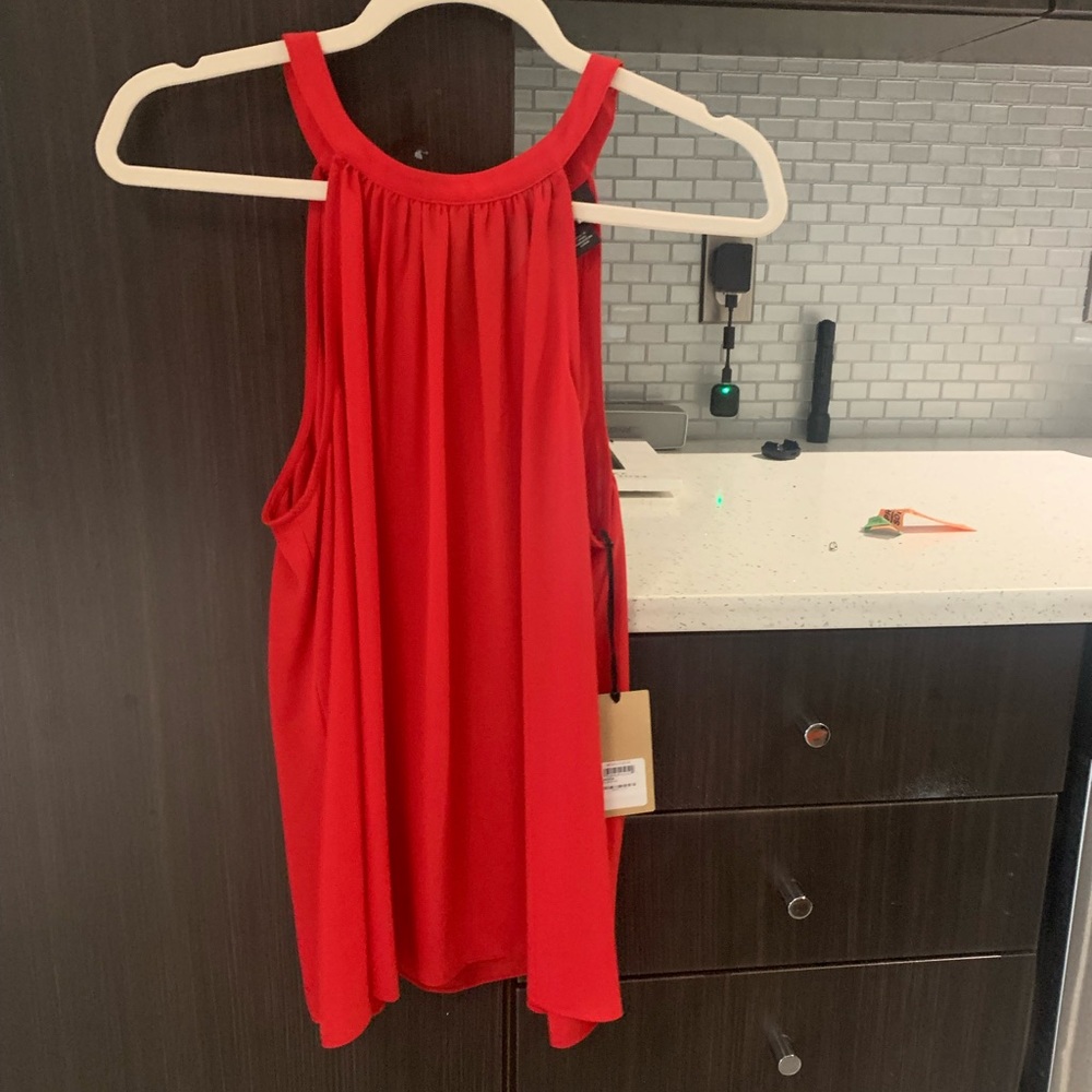 Red halogen tank with black bow back